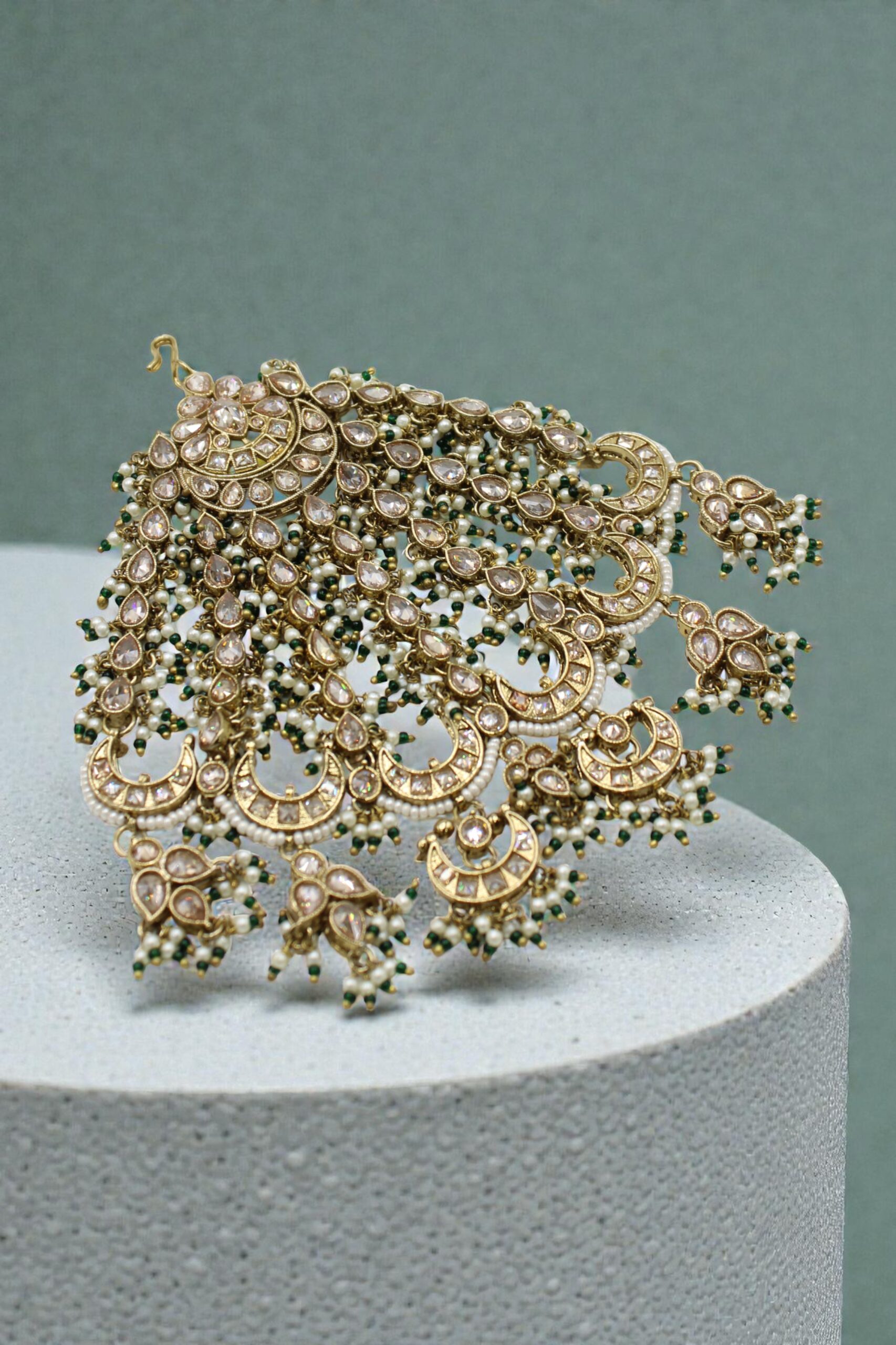 Intricate Traditional Indian Jewelry with Pearls and Green Accents - Image 2