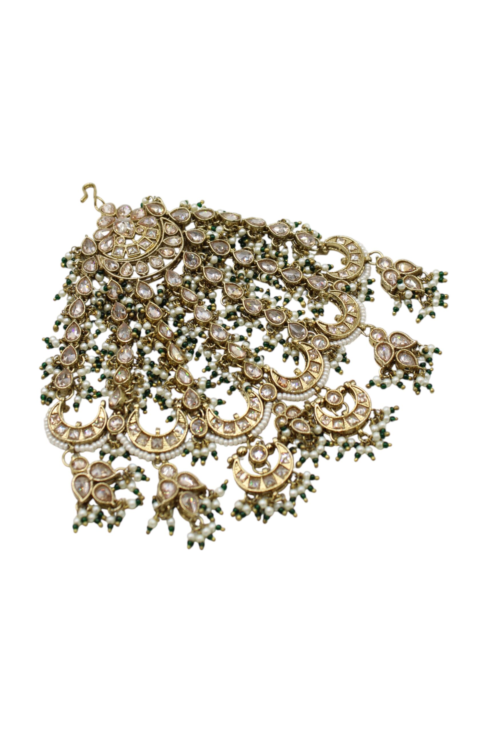 Intricate Traditional Indian Jewelry with Pearls and Green Accents