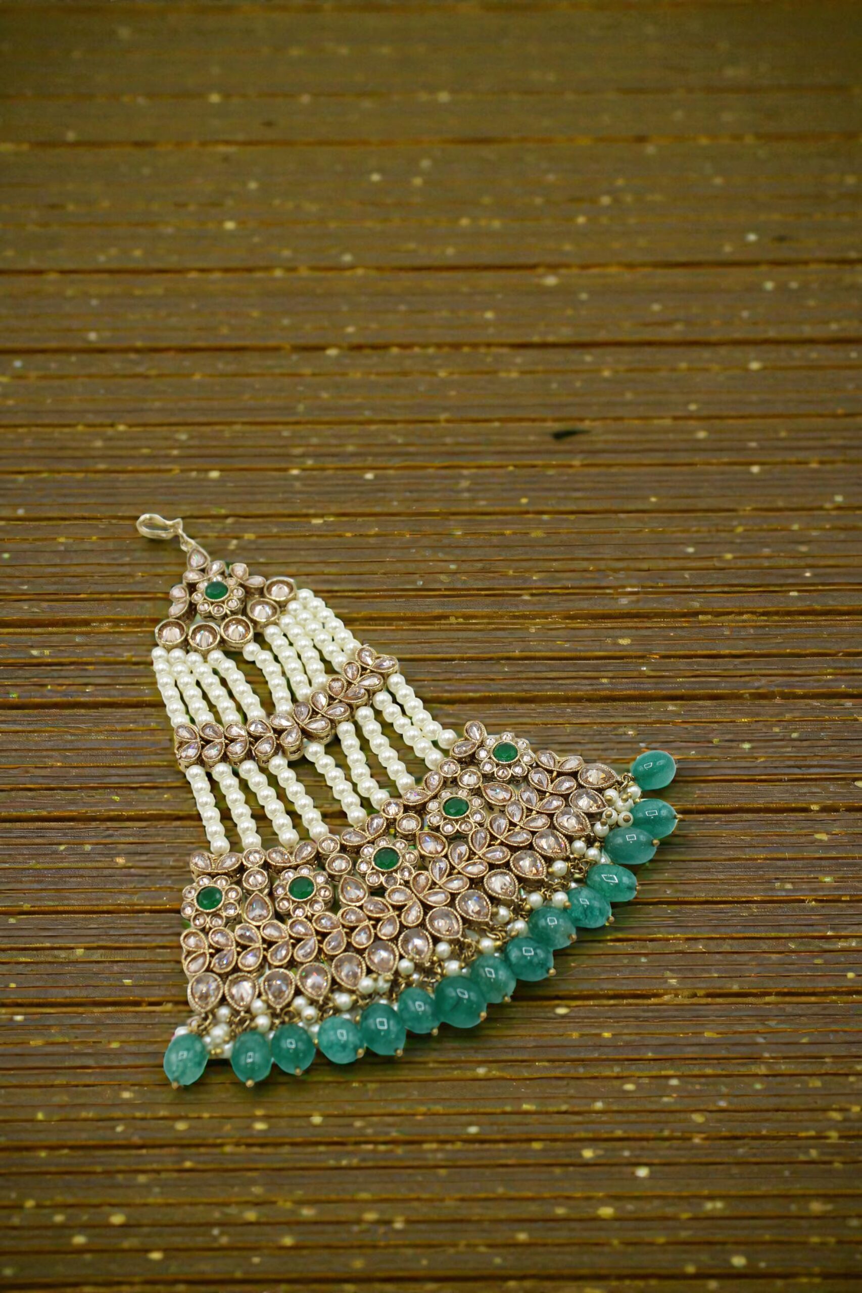 Elegant Traditional Indian Jewelry with Pearls and Green Accents - Image 3